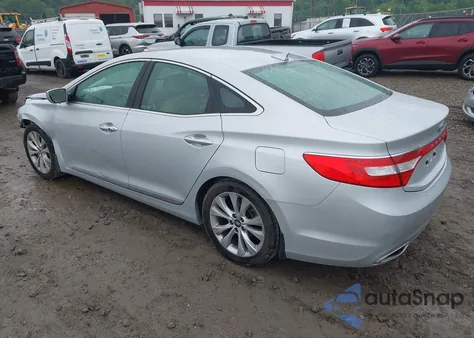 2014 Hyundai Azera Limited z USA, uszkodzony, nr VIN KMHFH4JG1EA424547